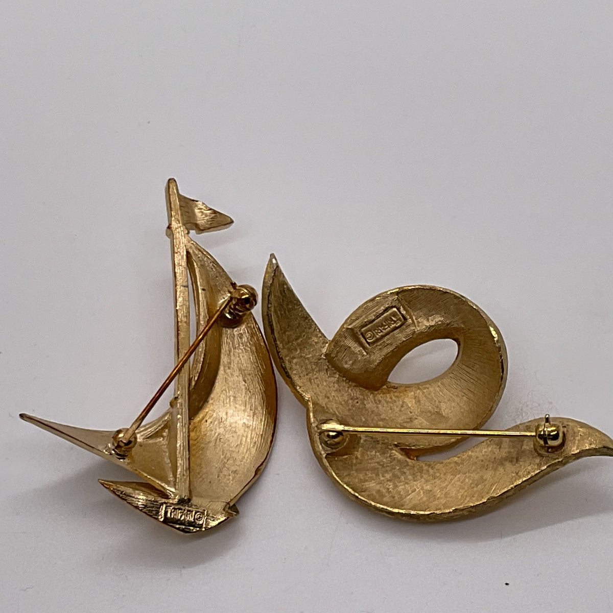 VTG. Crown TRIFARI Gold Tone Brushed 2.25" Sailboat & 2.5" Swirl Brooches