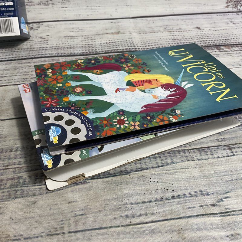 Moonlite Storytime App Compatible Mini Projector w/ Mulan, Uni The Unicorn Reels
