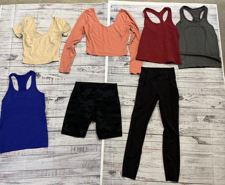 Women's Lot of 7 Lululemon Tops, Leggings, and Bicycle short Assorted Sizes